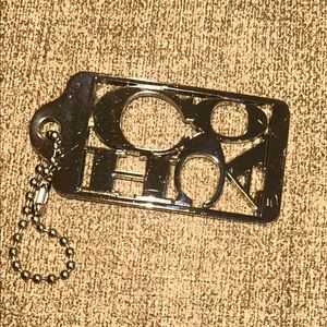 Coach 70th Anniversary Metal Hangtag Bag Charm Cutout - Silver Tone